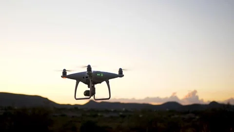 Drone Comes Down Into Focus At Dusk Stock Footage 115044680