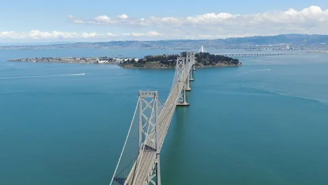 Drone Coming Down on incoming Bay Bridge Traffic Stock Footage 127945683