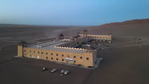 Drone Completes Full Counter-Clockwise Orbit of Desert Fortress, Turpan Stock Footage 327830463