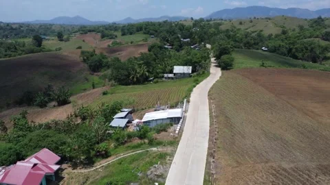 Drone of a constructed road on the edge of the mountain Stock-Footage 293897355