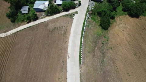 Drone of a constructed road on the edge of the mountain Stock Footage 293897682