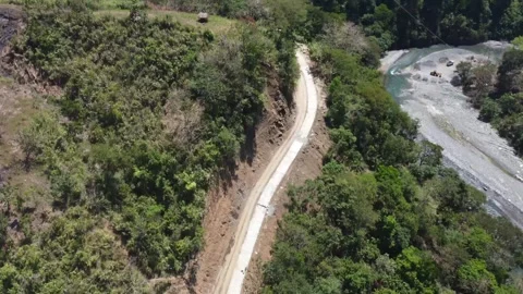 Drone of a constructed road on the edge of the mountain Stock-Footage 293903794