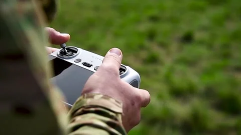 Drone control panel is in hand of military soldier Stock Footage 305988433