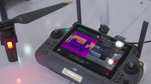 Drone Controller Shows thermal map and Video, Drone industry solution Video stock 234595573