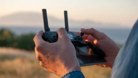 Drone controller in sunset Stock Photos