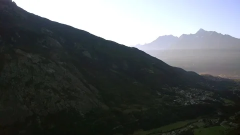 Drone copter turning 360 degrees showing top view of mountainous landscape  Stock Footage 120007879