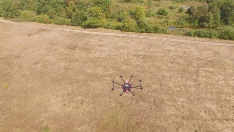 Drone copter UAV - aerial video shooting flying on eight propellers oktocopter Stock Footage