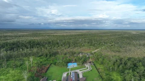 Drone Country border between Indonesia and Papua New Guinea with clouds 動画素材 279995487