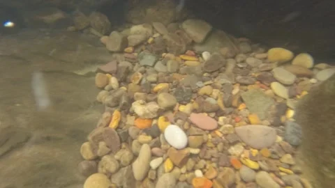 Drone crashed into water stream, then resurfaced Stock Footage 305296223