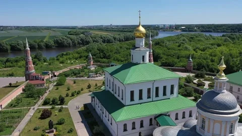 Drone crossing monastery complex on diagonal path Stock Footage 327408644