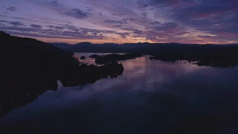 Drone Dark Lake Pull Back Boats, Windermere Sunrise Lake District Stock Footage 102942242