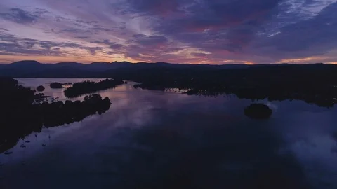 Drone Dark Lake Tight to Left Hill Silhouette, Windermere Sunrise Lake District Stock Footage 102944719