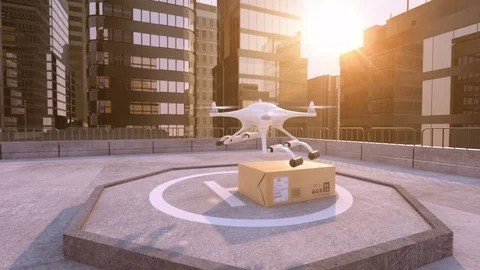 Drone delivers a package to a building roof Stock Footage