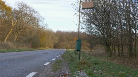 Drone delivers a package at a mailbox Stock Footage 82539568