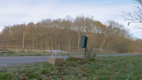 Drone delivers a package at a mailbox Stock Footage 82540721
