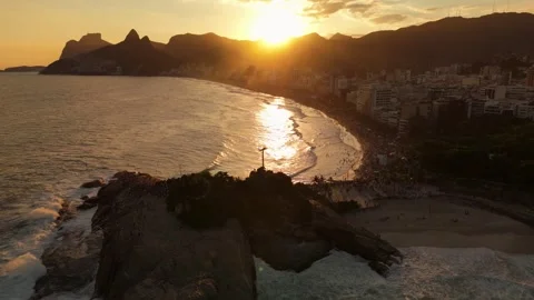 Drone Descend Flyover Of Arpoador At Sunset In Rio De Janeiro Stock Footage 324768541