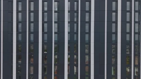 Drone Descending Along Modern Skyscraper Facade In Birmingham UK Stock Footage 334631710