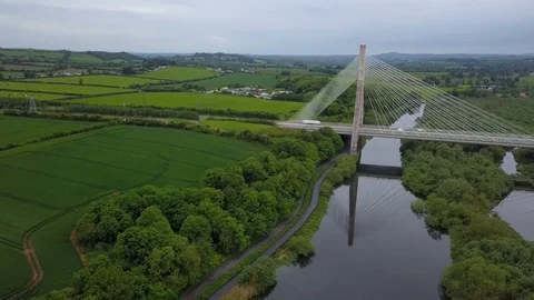 Drone descending in front of a cable bridge 스톡 동영상 108919165