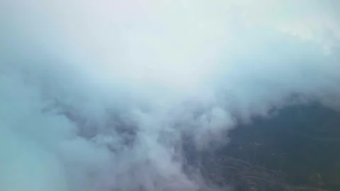 Drone Descending into Heavy Cloud Layer 库存影片 333338164