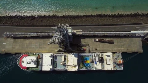 Drone descending on livestock ship loading cattle for export in Australia. Stock Footage 87252890