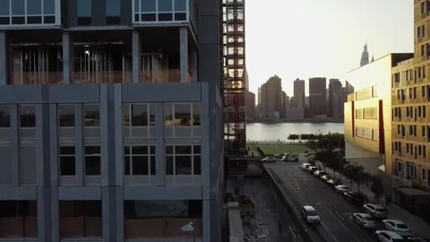 Drone descending on the side of a residential construct site. Stock Footage 138955252