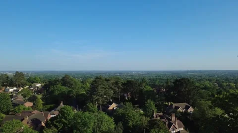 Drone descending to street level in Tilehurst, Reading Stock Footage 335652955