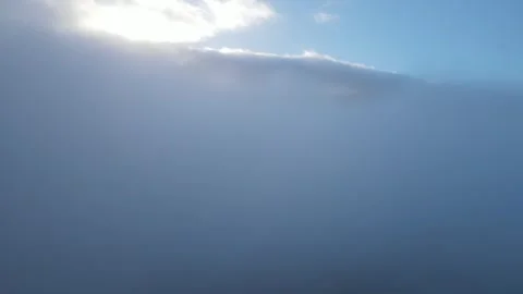 Drone Descending Through Morning Clouds at Sunrise in Vietnam Vidéo 343720058