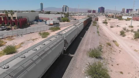 Drone Descending As Train Moves By On Tracks Stock Footage 149165411