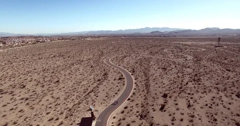 Drone descends over path Stock Footage 76196150