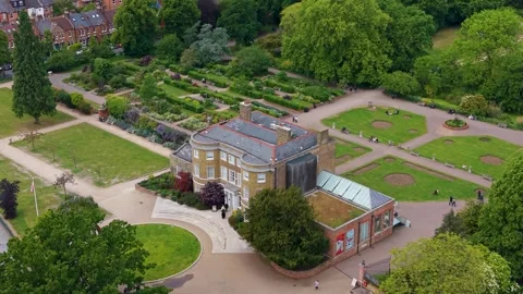 Drone descends over William Morris House at Lloyd Park, Walthamstow, London Stock Footage 336402989