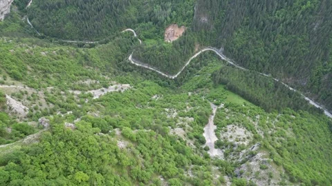 Drone Descent Down the Eagle Eye Cliff Toward Yagodina Gorge, Bulgaria Stock Footage 340832863