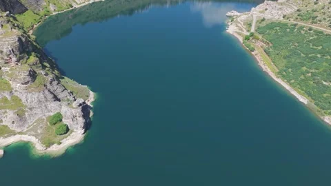 Drone Descent Toward a Crystal-Clear Historic Lake Stock-Footage 341030731