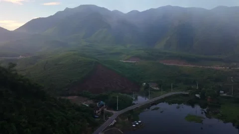 Drone Descent Toward River Valley and Mountain Landscape Stock Footage 336857200
