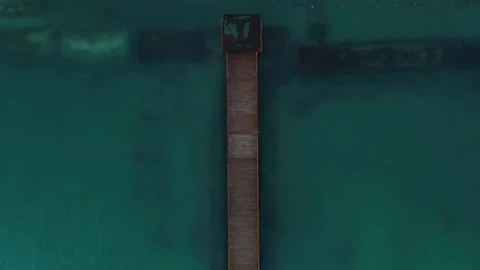 Drone Descent Towards Pier with Ample Space on Both Sides for Text Placement. Stock Footage 270192516