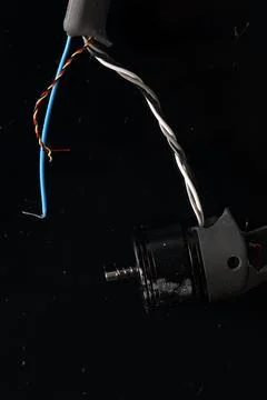 Drone DJI Mavic 3 after crashed on a black background. Drone after falling from Stock Photos
