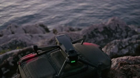 Drone dji mavic 3 take off from the backpack Stock Footage 232960492