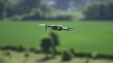 Drone DJI Mavic Pro moves smoothly in the air Stock Footage 162242505