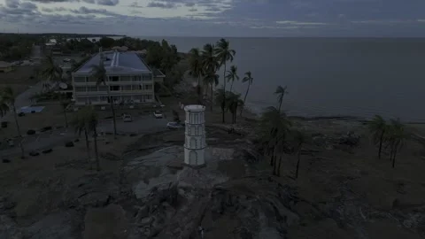 Drone does 360 around Dreyfus Tower at sunset in Kourou, French Guiana Stock Footage 289131345