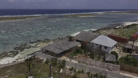 Drone does 360 in medium wide shot of Usumba Rock on a sunny morning Stock Footage 344057101