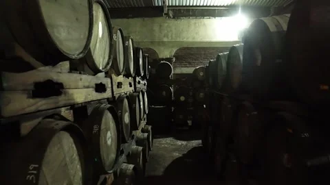 DRONE: DOLLY IN OF A BARREL ROOM OF RUM 스톡 동영상 292868157