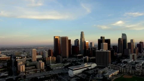 Drone dolly left across downtown LA skyline at dusk Stock-Footage 89819906