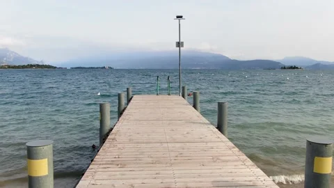 Drone Dolly Out Over Pier into Lake Stock Footage 219740122