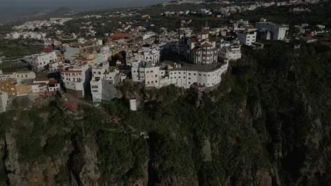 Drone dolly out shot over the church of the town of Moya, Gran Canaria Stock Footage 160212814