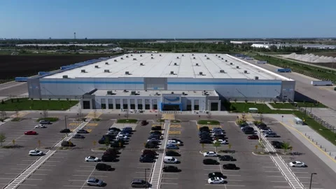 Drone Dolly Shot Above Amazon Fulfillment Center Stock Footage 338158061