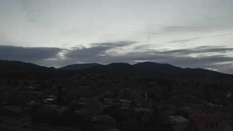 Drone dolly shot over Santa Fe at dusk as the lights twinkle Stock-Footage 167659341