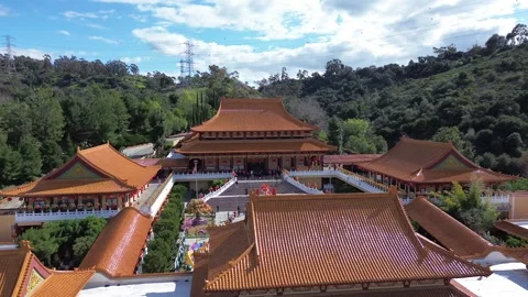 Drone dolly-in shot of the temple complex Stock Footage 264077166