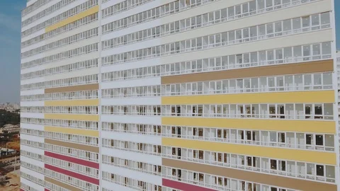 Drone drift very close modern dormitory area apartment houses panel building new Stock Footage 129469669