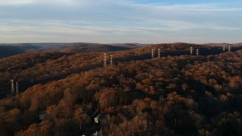 Drone drone shot of fall mountains with powerlines Video stock 104071484