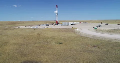 Drone drop and semi orbit of a fracking operation for oil and gas 2021. 4k Stock Footage 167931372