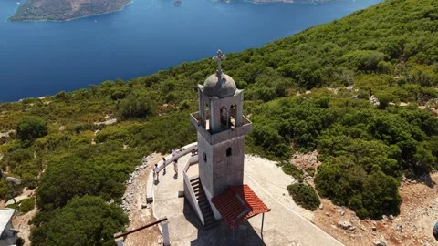 Drone drop height and reveal Vathy bay from monastery, Ithaca Vídeos de archivo 345040036